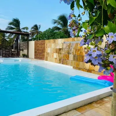 A piscina em ou perto de Casa Dférias Icaraizinho - piscina, cascata hidro