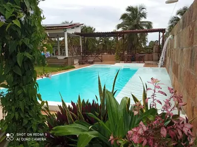 A piscina em ou perto de Casa Dférias Icaraizinho - piscina, cascata hidro