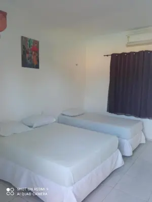 Uma cama ou camas num quarto em Casa Dférias Icaraizinho - piscina, cascata hidro