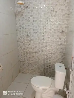 Uma casa de banho em Casa Dférias Icaraizinho - piscina, cascata hidro