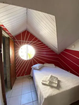 Uma cama ou camas num quarto em Pousada Oásis