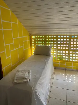 Uma cama ou camas num quarto em Pousada Oásis