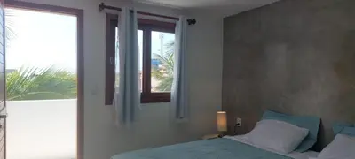 Uma cama ou camas num quarto em ROOFTOP Suítes JERI