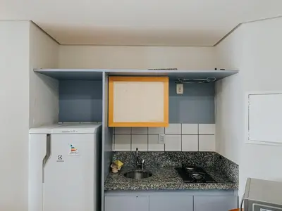 A cozinha ou kitchenette de Conforto e Vista Maravilhosa no Hotel Iate Plaza