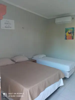 Uma cama ou camas num quarto em Casa hóspedes Dferiasicaraizinho