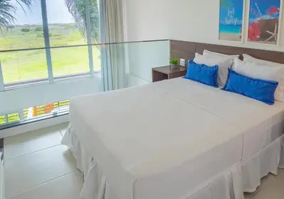 Uma cama ou camas num quarto em Lofts Collection by The Coral
