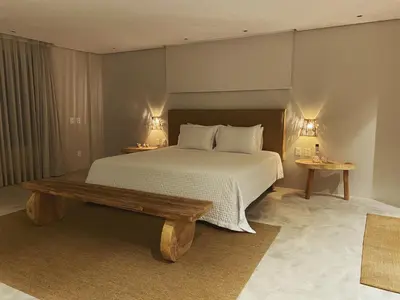 Uma cama ou camas num quarto em Beach House Brazil