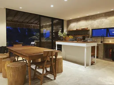 Uma televisão e/ou sistema de entretenimento em Beach House Brazil
