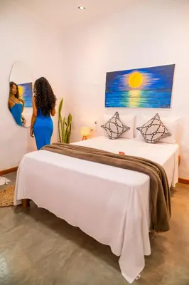 Uma cama ou camas num quarto em Suite Lua Preazen