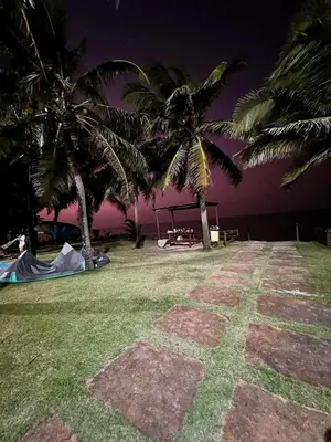 Um jardim no exterior de Breezes do Cumbuco - Cobertura!