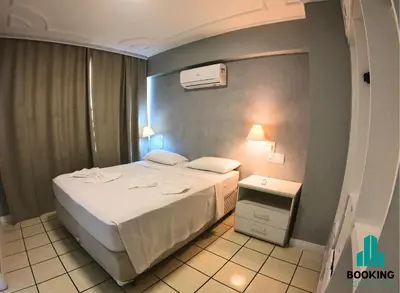 Uma cama ou camas num quarto em Estoril Praia de Iracema
