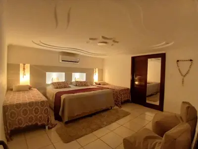 Uma cama ou camas num quarto em Vila Nordestina