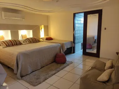 Uma cama ou camas num quarto em Vila Nordestina
