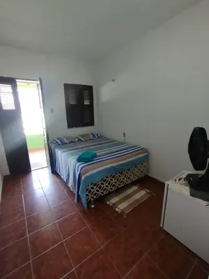 Uma cama ou camas num quarto em Pousada Panorama do Mar