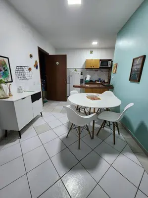 A cozinha ou kitchenette de Lindo apartamento próximo ao Beach Park