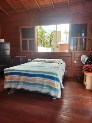Uma cama ou camas num quarto em Vila do Rico