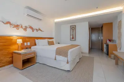 Uma cama ou camas num quarto em Afago Mareiro Hotel