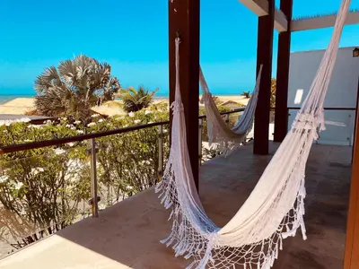 Uma varanda ou terraço em DUPLEX TAIBA BEACH RESORT