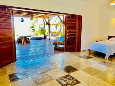 Uma cama ou camas num quarto em villa wetdreams