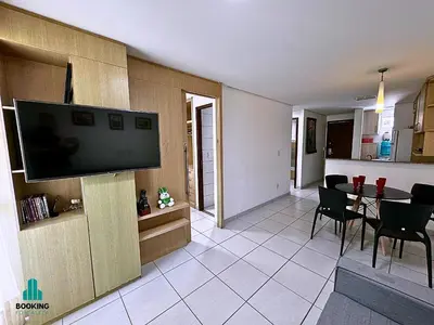 Uma televisão e/ou sistema de entretenimento em Beach Class Fortaleza by Holiday Stays