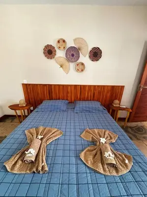 Uma cama ou camas num quarto em Casa de Sabá
