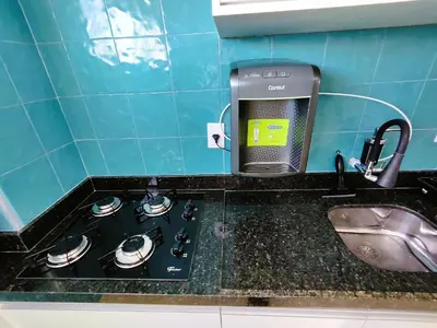 A cozinha ou kitchenette de Belo apartamento projetado e vista total mar !