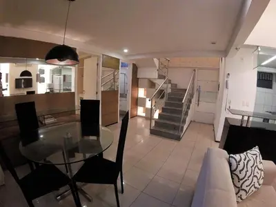 Uma área de estar em Localização TOP e comodidade na incrível cobertura