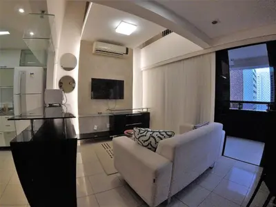Uma área de estar em Localização TOP e comodidade na incrível cobertura