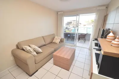 Uma área de estar em Praia Iracema Apartment