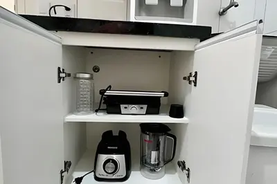 A cozinha ou kitchenette de Bouganville Apartments