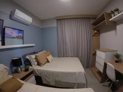 Uma cama ou camas num quarto em Lindo apartamento com vista mar 2 quartos 1501