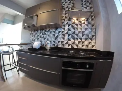 A cozinha ou kitchenette de Lindo apartamento com vista mar 2 quartos 1501