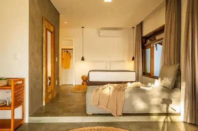 Uma cama ou camas num quarto em Nordisch- Chalés