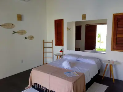Uma cama ou camas num quarto em Villa Bôa Viagem