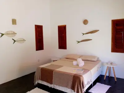 Uma cama ou camas num quarto em Villa Bôa Viagem