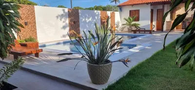 Um jardim no exterior de Lazer Paracuru