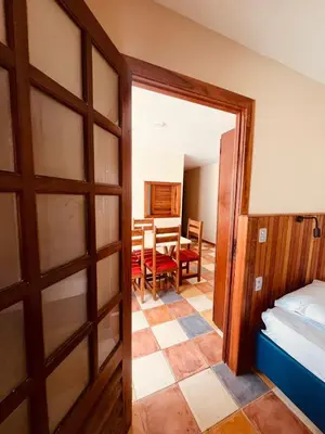 Uma cama ou camas num quarto em Porto Praia Hotel