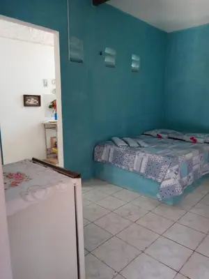 Uma cama ou camas num quarto em Casa azul