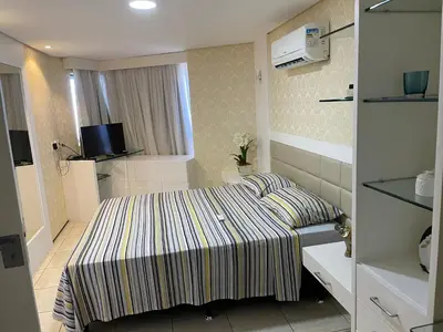 Uma cama ou camas num quarto em Apart Iate Plaza