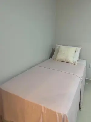 Uma cama ou camas num quarto em Casinha Azul Taiba