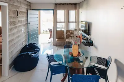 Uma área de estar em Casinha Azul Taiba