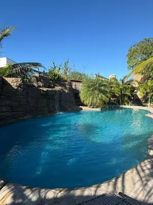 A piscina em ou perto de Chalé dos Anjos