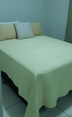 Uma cama ou camas num quarto em Apartamento Messejana 101