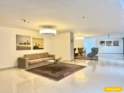 Uma área de estar em Landscape melhores apartamentos da Beira Mar