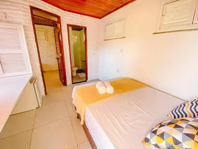 Uma cama ou camas num quarto em Hotel Sunshine Centro Cumbuco