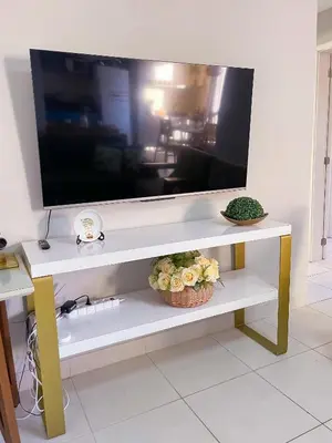 Uma televisão e/ou sistema de entretenimento em Vg Sun Cumbuco condomínio completo