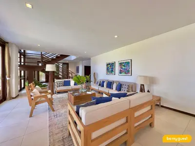 Uma área de estar em Villas - Beach House