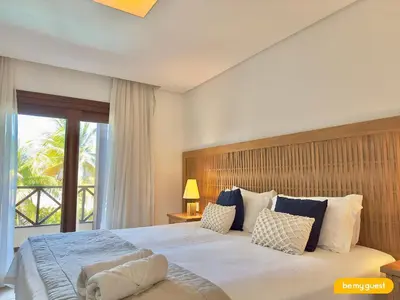 Uma cama ou camas num quarto em Villas - Beach House