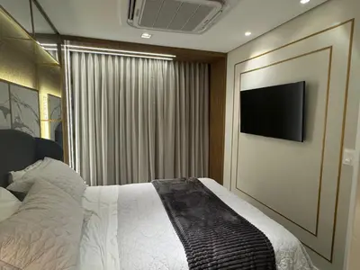 Uma cama ou camas num quarto em Apto Landscape beira mar