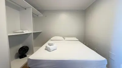 Uma cama ou camas num quarto em Iracema Residence Frente Mar by Escala Imóveis